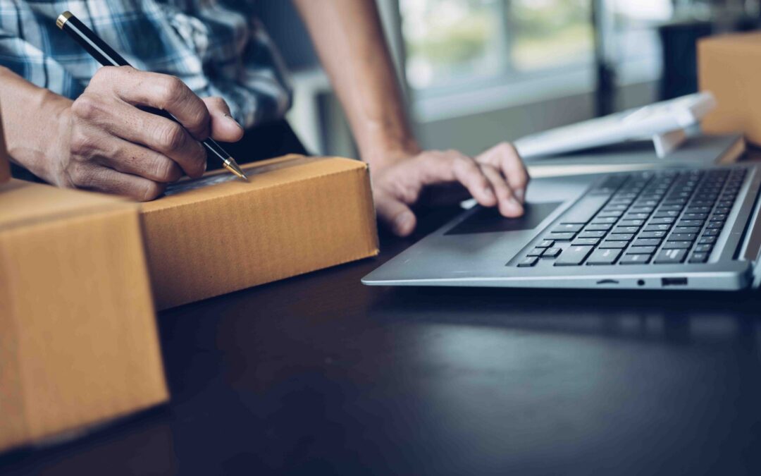 Close up business man hands freelancer sme warehouse checking em